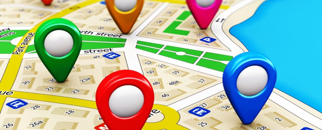 A colorful map with location pins marking various spots, symbolizing the navigation of Disney parks.